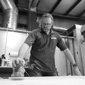 Dave Reed preparing a newly made cabinet, Urbandale, Iowa