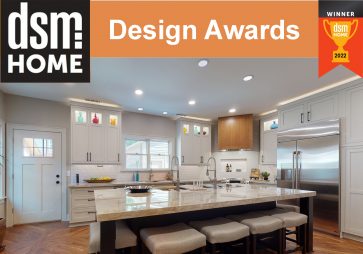 This white kitchen remodel with wood accents was a winner at the DSM Design Awards.