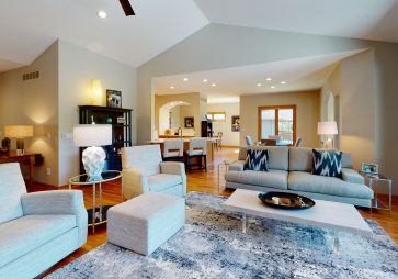 Wood floors with white and tan walls for a warm and inviting space.