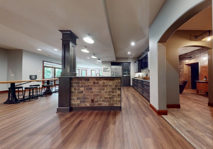 Tucked away in a beautifully finished lower level, this basement bar remodel brings a touch of vintage charm with modern luxury. Designed in collaboration with JY Design, the space channels the ambiance of a classic speakeasy, complete with rich textures, moody lighting, and unexpected design details.